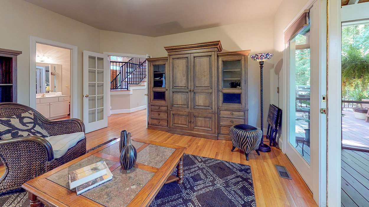 3545 Hope Valley Road Durham, NC 27707 - Photo 13 of 30 Currently used as a TV room, it opens to the screened porch and has a full bath and walk-in-closet. It is actually the original master bedroom. Second Bedroom on first Floor Currently used as TV Room