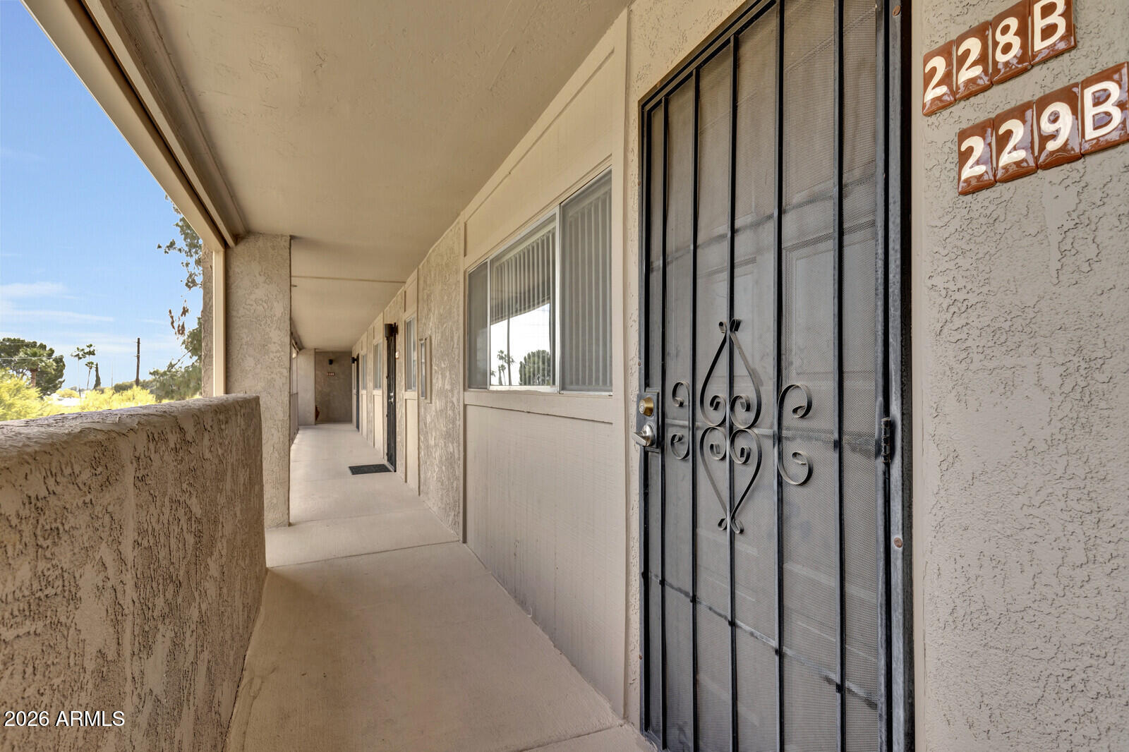 7436 East Chaparral Road, Unit B228 Scottsdale, AZ 85250 - Photo 3 of 17 a view of a hallway with a livingroom and dinning room