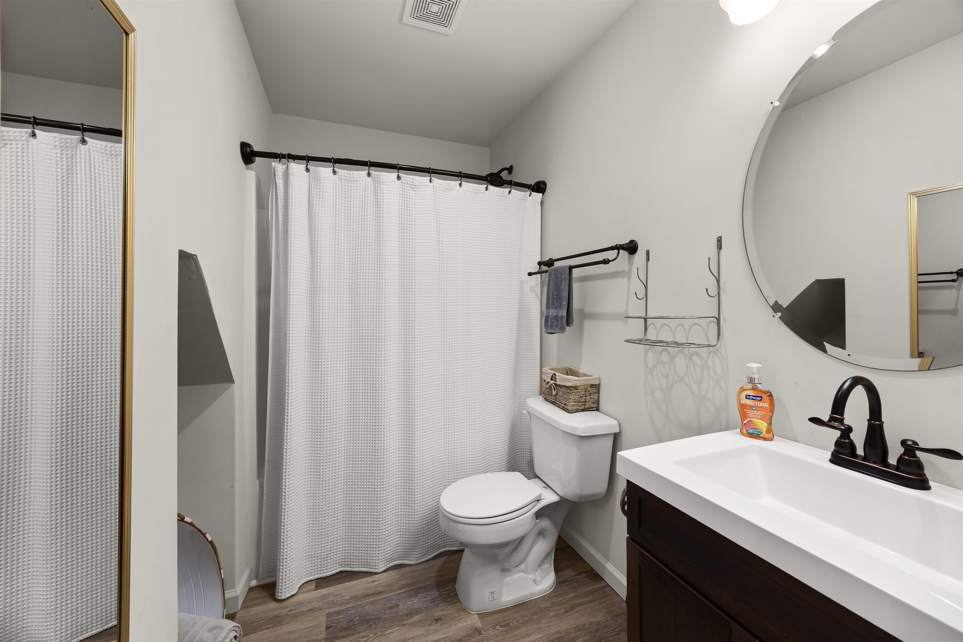 15 Bogey Loop Counce, TN 38326 - Photo 10 of 17 a bathroom with a sink a toilet and a mirror
