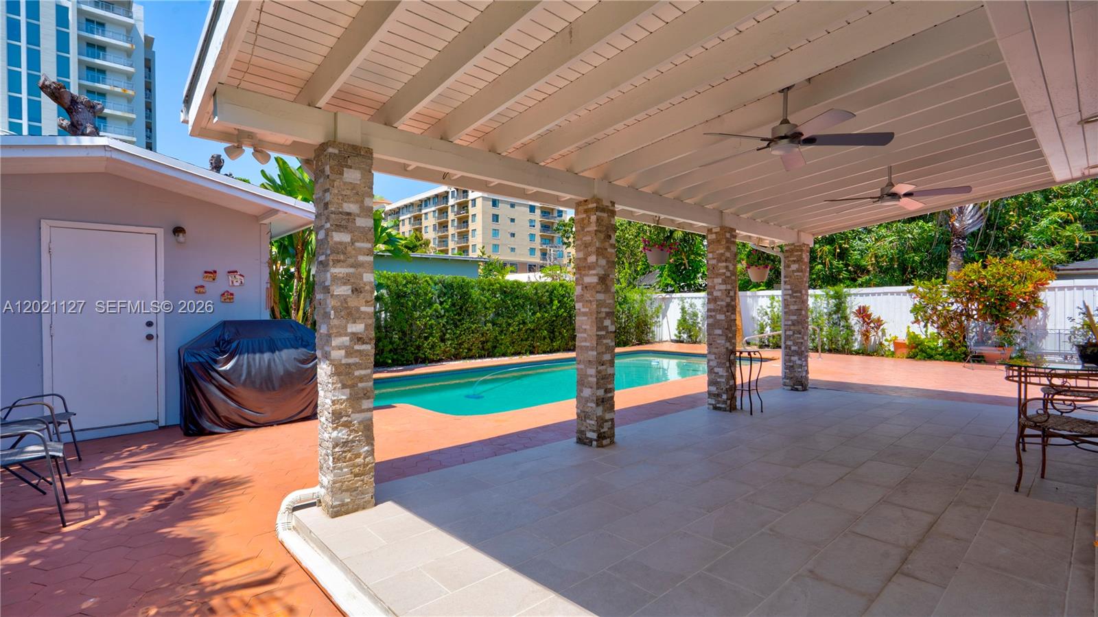 3611 Southwest 23rd Street Miami, FL 33145 - Photo 32 of 56 3613 - view of shed from terrace