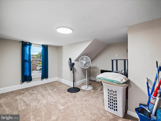 a view of living room with washer and dryer