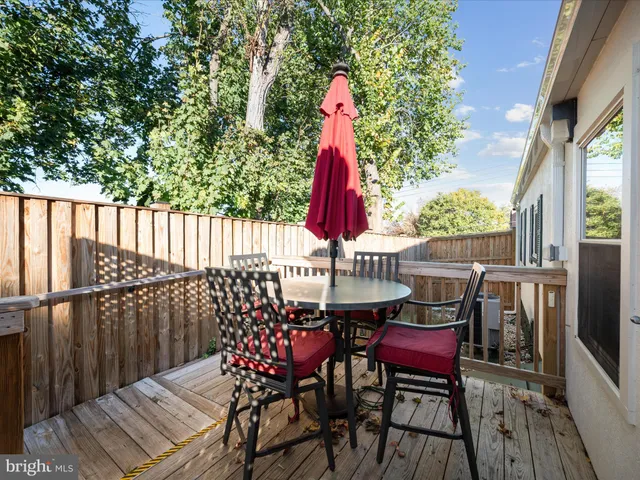 a view of a tennis ground with a large window