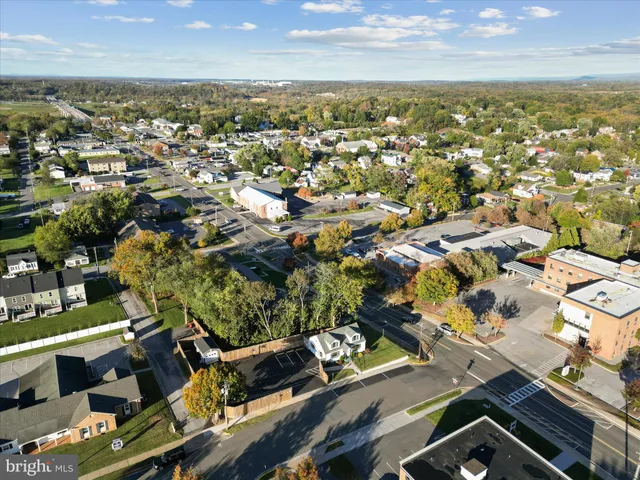an aerial view of residential building with parking space