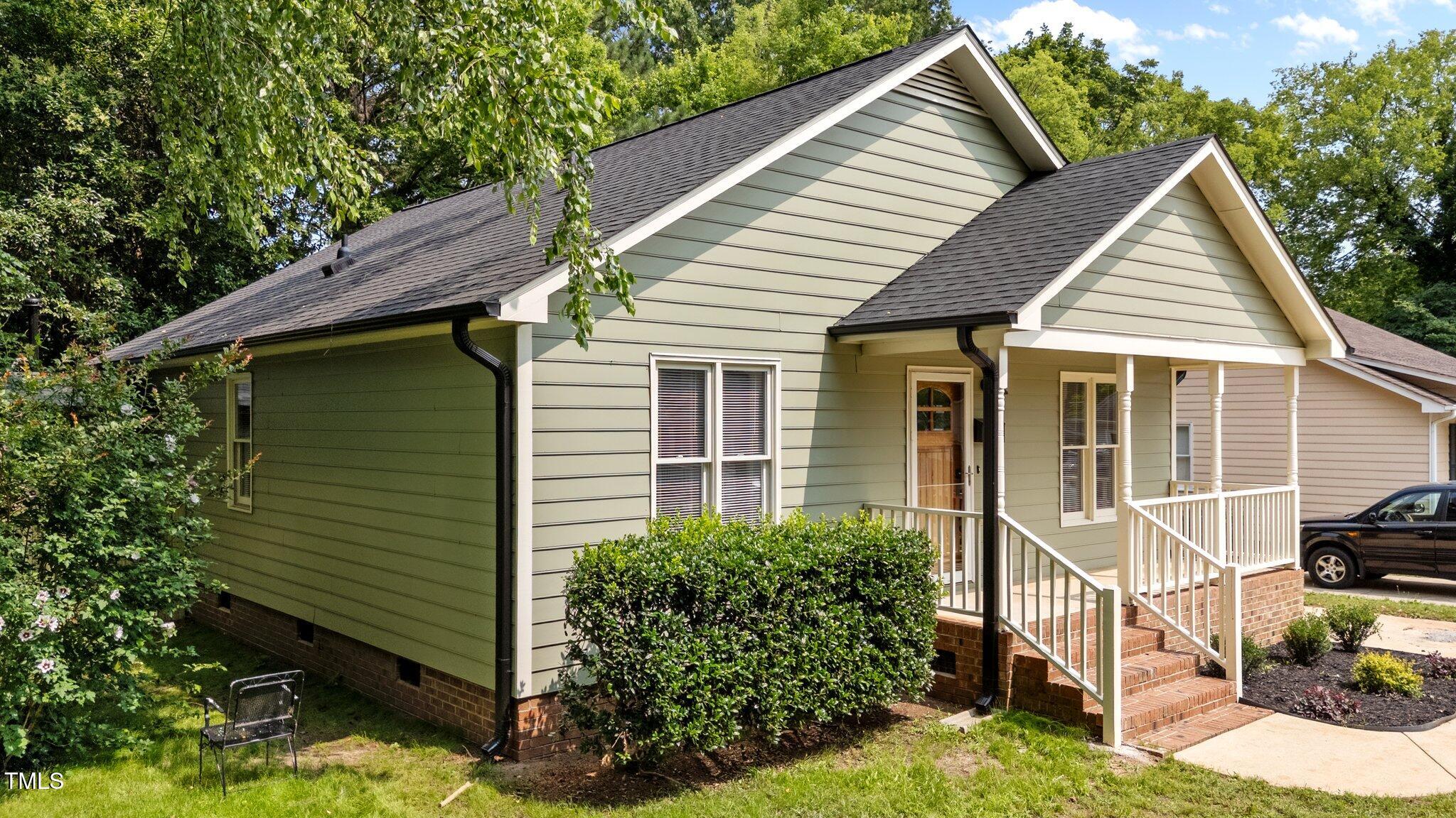 413 Top Greene Lane Raleigh, NC 27601 - Photo 2 of 31 4-web-or-mls-DJI_20250602152523_0477_D