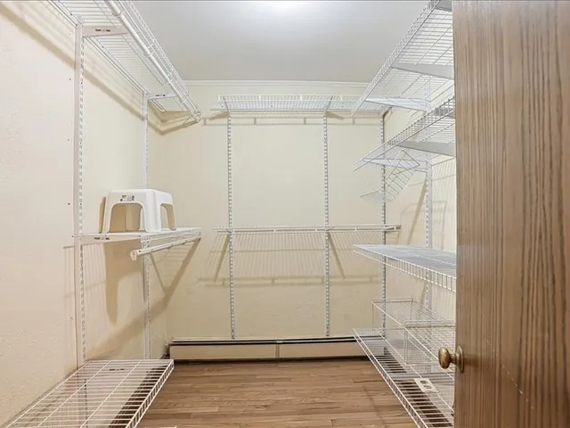a kitchen with granite countertop a sink and cabinets