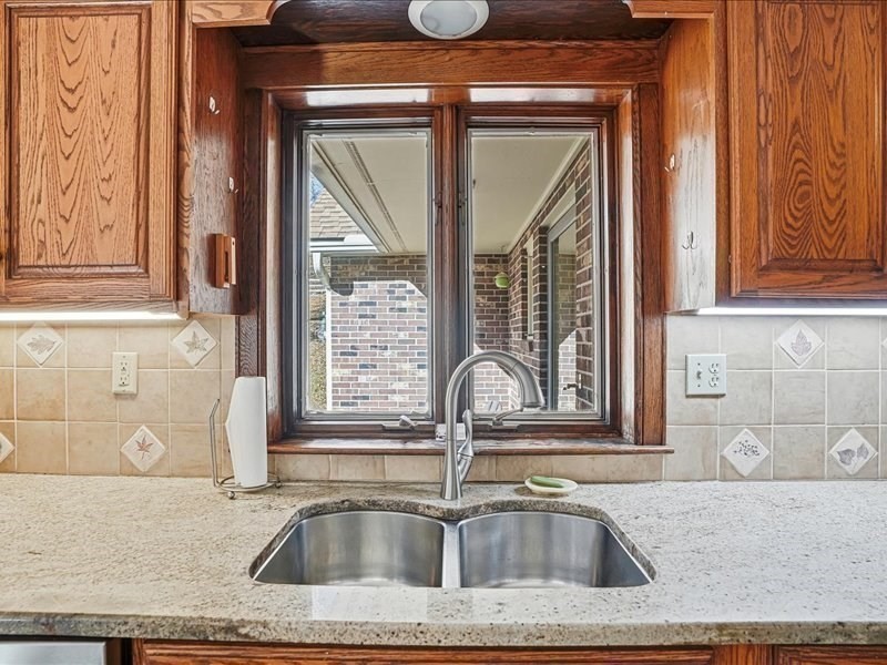 15 North Cove Road Sterling, MA 01564 - Photo 16 of 37 a kitchen sink with a granite countertop window
