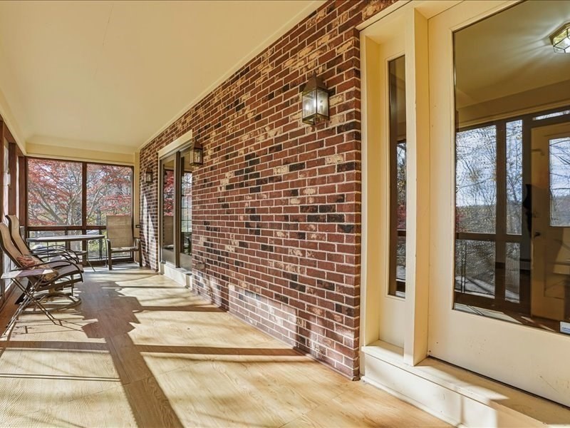 15 North Cove Road Sterling, MA 01564 - Photo 21 of 37 a view of a brick building with large windows