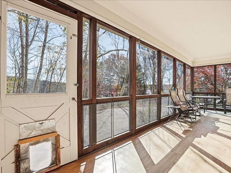 15 North Cove Road Sterling, MA 01564 - Photo 22 of 37 a view of a living room and floor to ceiling window or lake