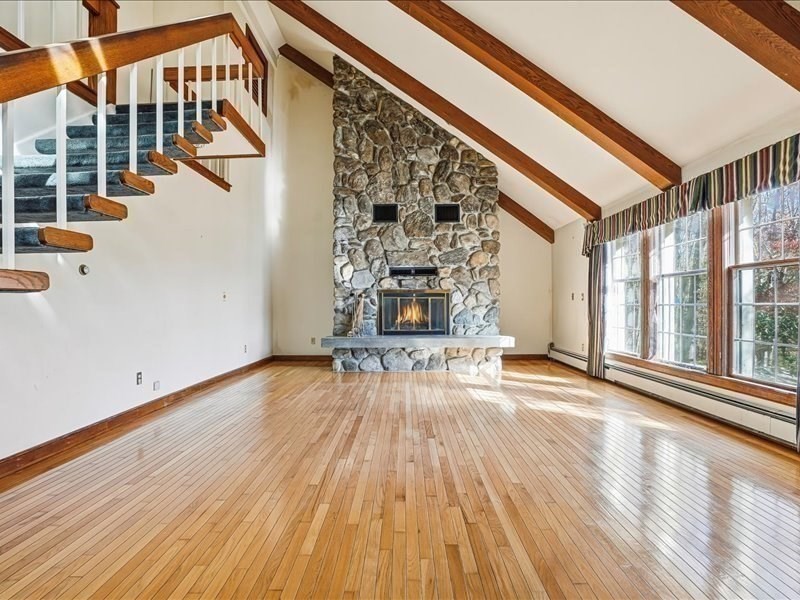 15 North Cove Road Sterling, MA 01564 - Photo 24 of 37 an empty room with wooden floor and windows