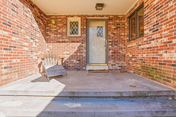 a view of house with patio