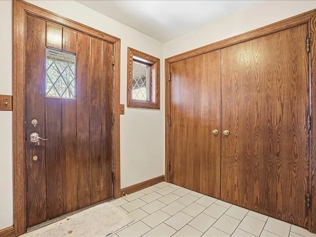 a view of storage and utility room with washer and dryer