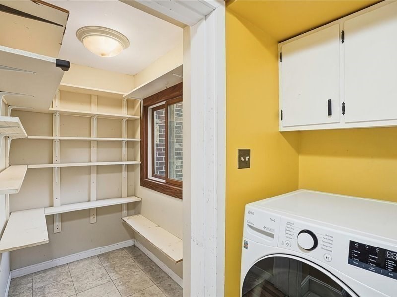 15 North Cove Road Sterling, MA 01564 - Photo 6 of 37 a view of storage and utility room with washer and dryer