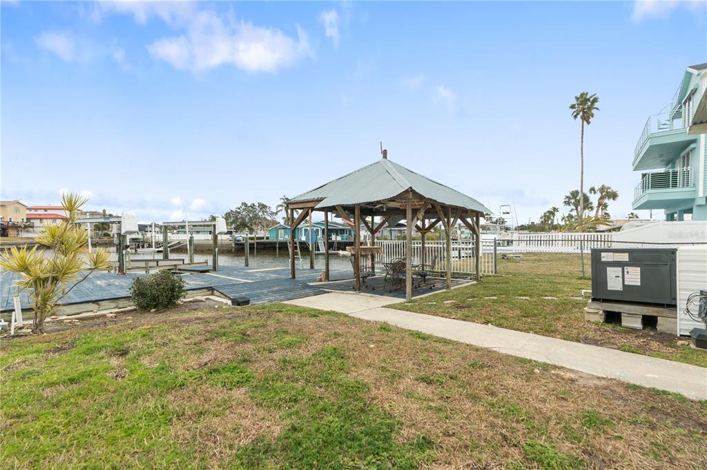 6501 Clark Street Hudson, FL 34667 - Photo 19 of 27 a view of a house with yard and sitting area