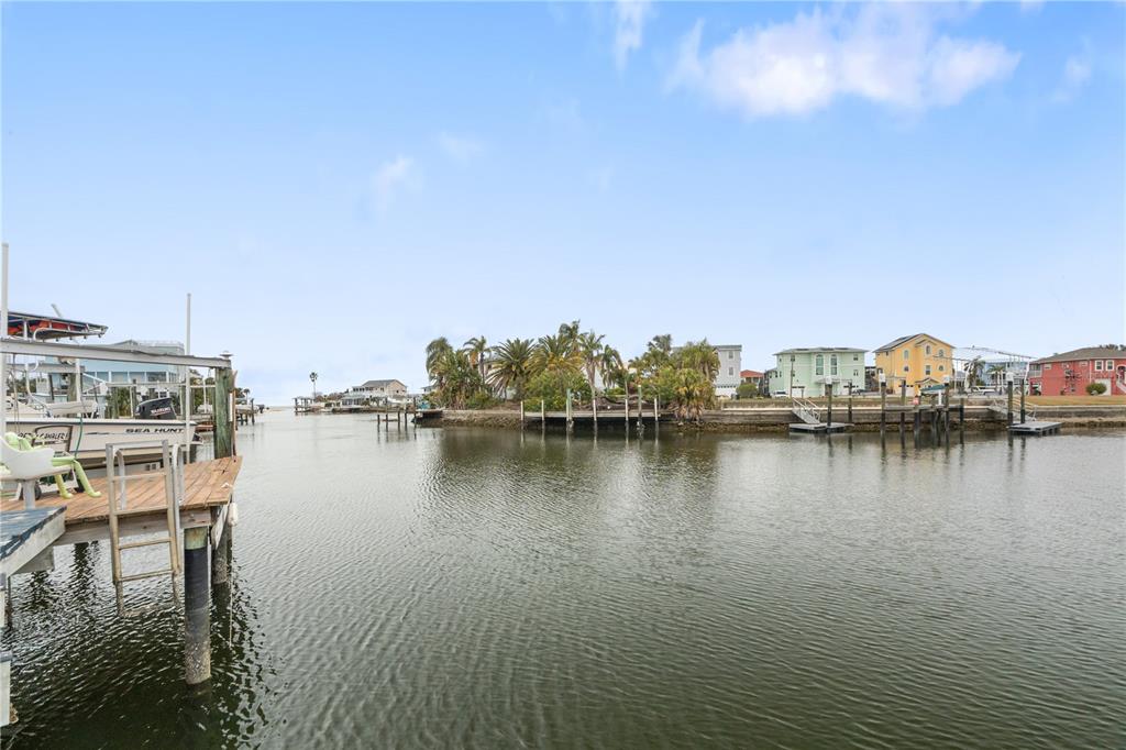 6501 Clark Street Hudson, FL 34667 - Photo 24 of 27 a view of a ocean with boats and trees in the background