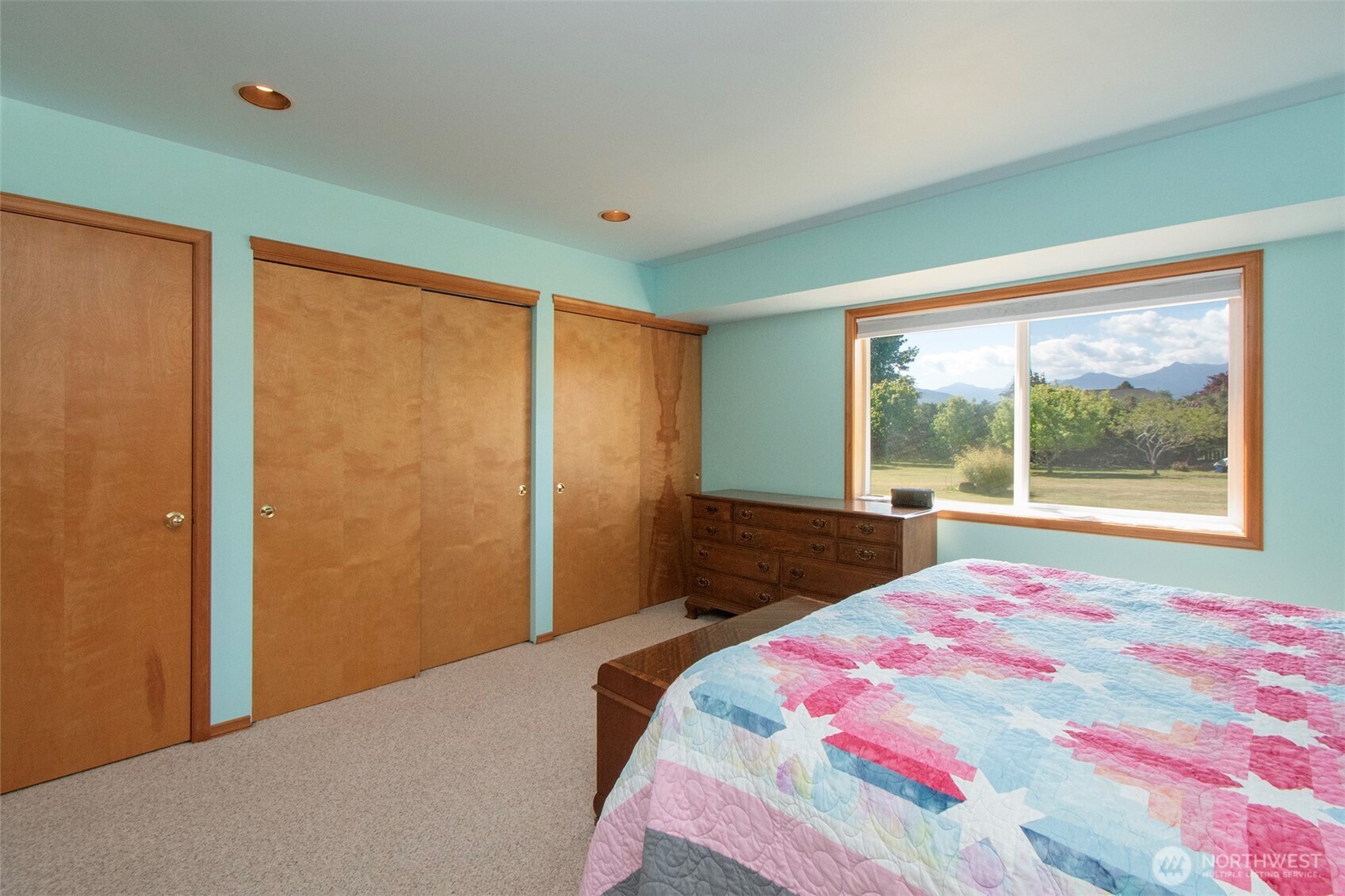 101 Timothy Lane Sequim, WA 98382 - Photo 24 of 39 a bedroom with a bed and a large window