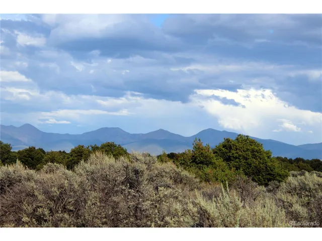 a view of a city and a mountain