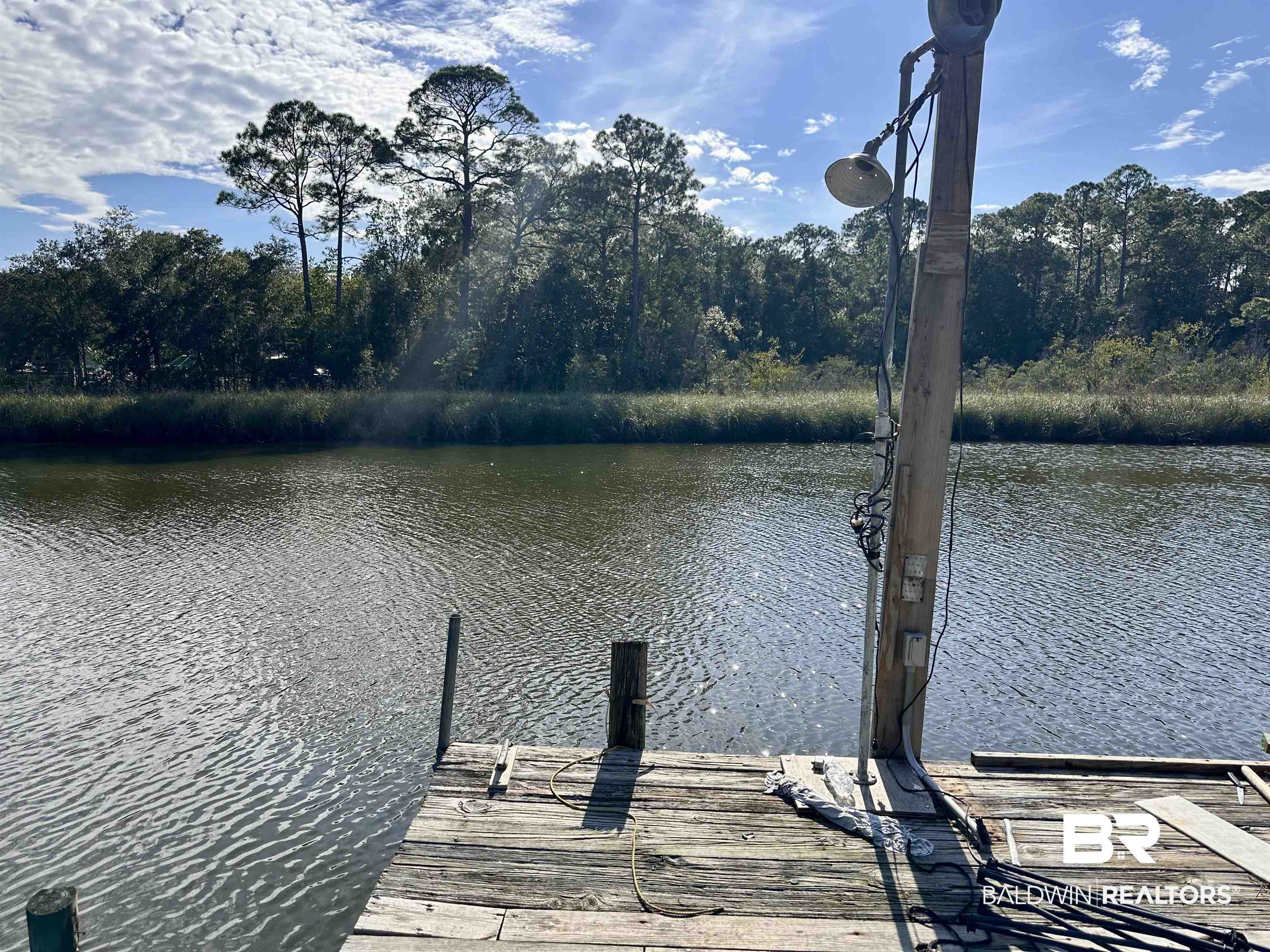 11057 Boudan Lane Foley, AL 36535 - Photo 3 of 18 Dock area featuring a water view