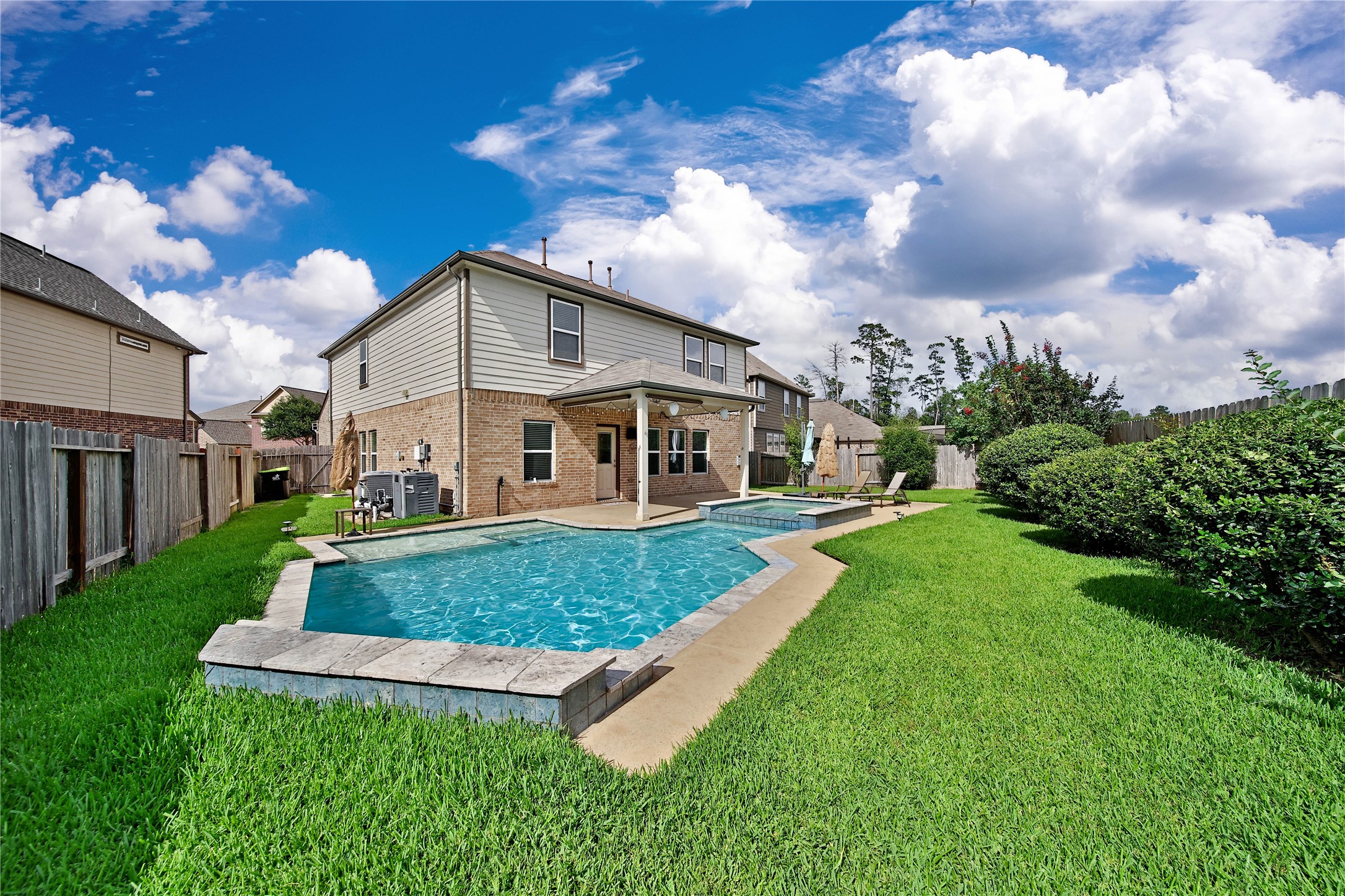 2672 Magnolia Fair Way Spring, TX 77386 - Photo 28 of 49 The sparkling pool and spa are refreshing for summer, especially with the privacy of NO REAR NEIGHBORS!