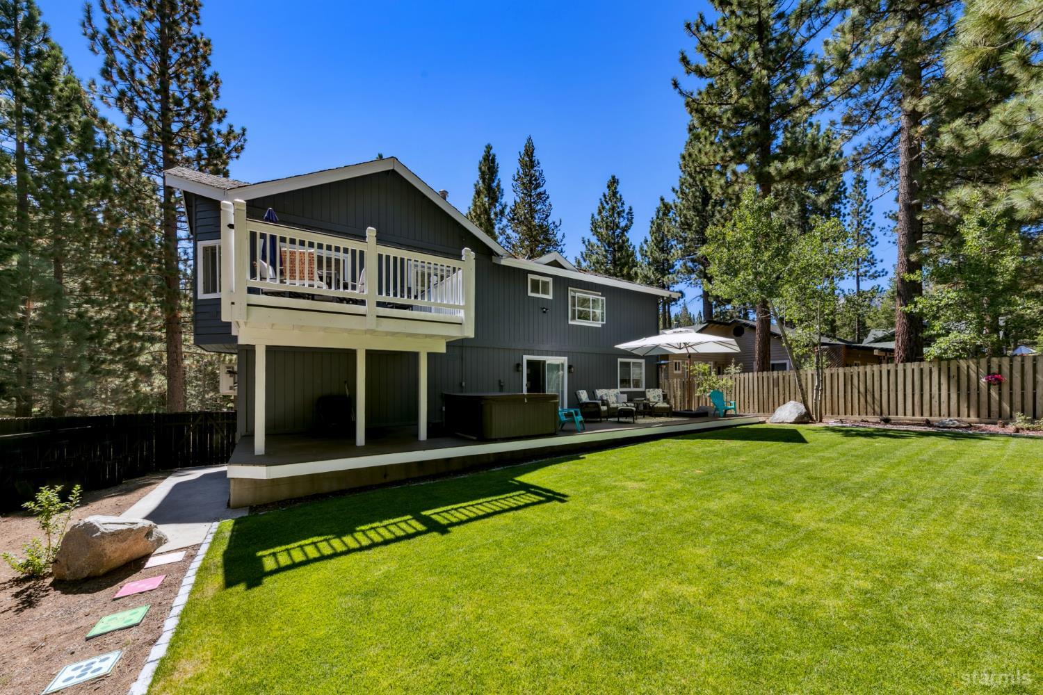1836 Grizzly Mountain Drive South Lake Tahoe, CA 96150 - Photo 18 of 40 a front view of a house with garden