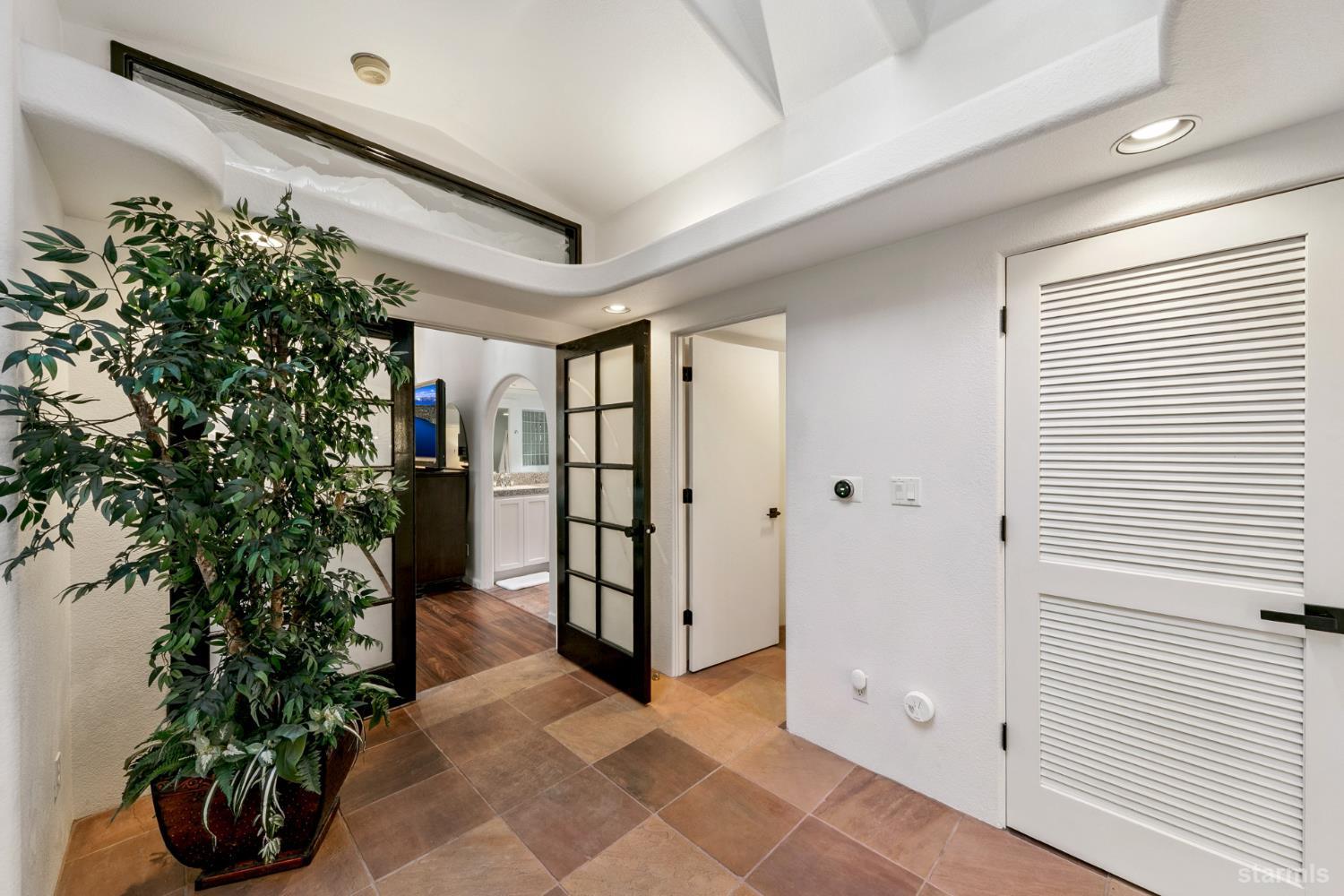 1836 Grizzly Mountain Drive South Lake Tahoe, CA 96150 - Photo 26 of 40 a view of entryway with flower plants