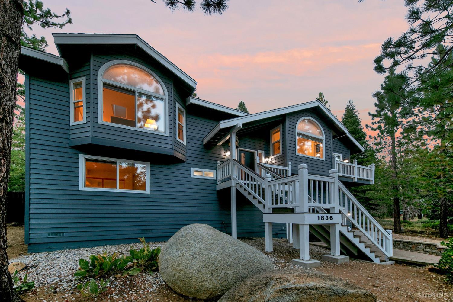1836 Grizzly Mountain Drive South Lake Tahoe, CA 96150 - Photo 37 of 40 a front view of a house with balcony