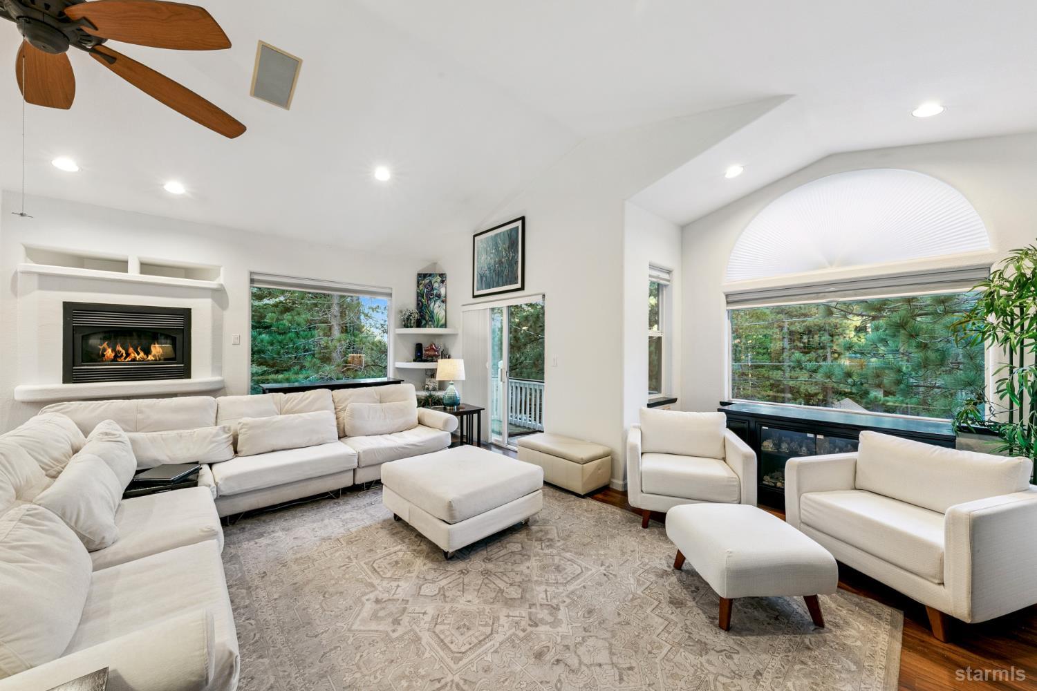 1836 Grizzly Mountain Drive South Lake Tahoe, CA 96150 - Photo 6 of 40 a living room with furniture and a large window