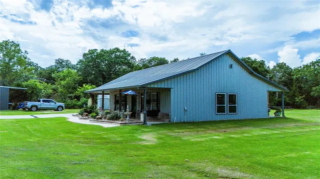 a view of an ocean and yard