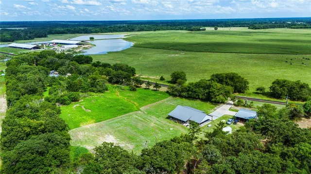 a view of a garden with an outdoor space