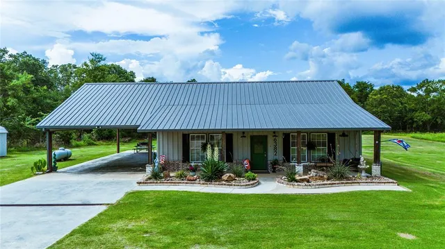 an outdoor space with potted plants