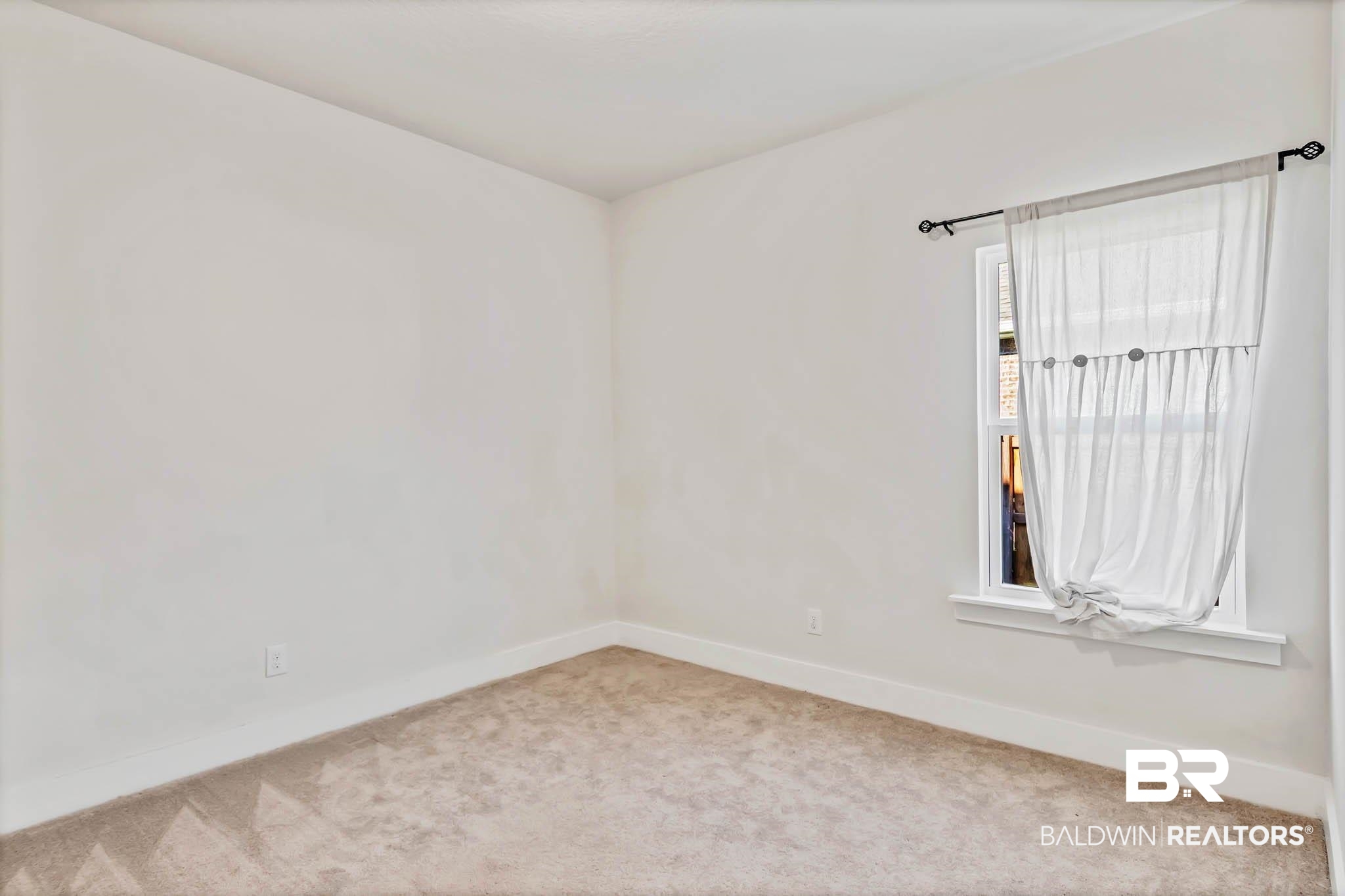 16461 Prado Loop Loxley, AL 36551 - Photo 31 of 78 Spare room featuring baseboards and carpet floors