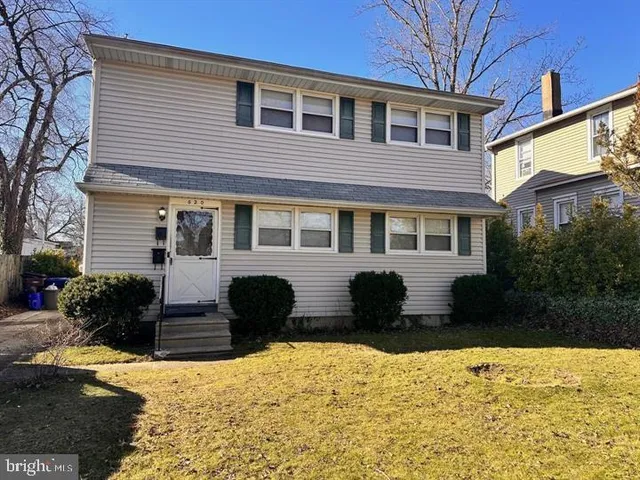 a front view of house with yard