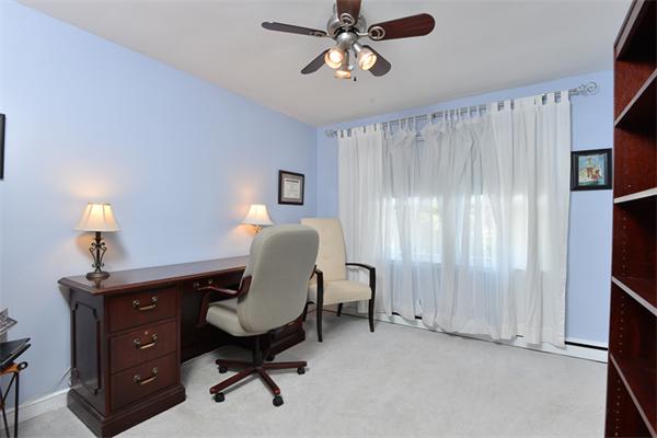 140 Governors Road Quincy, MA 02169 - Photo 17 of 24 a view of a workspace with furniture and a window