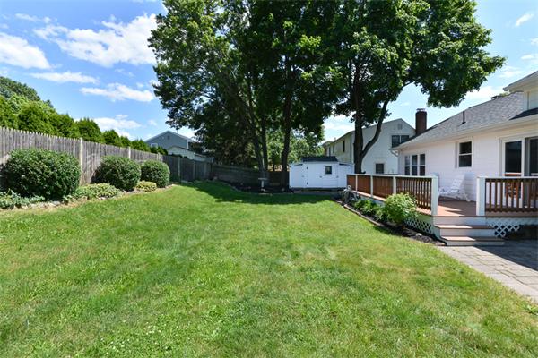 140 Governors Road Quincy, MA 02169 - Photo 22 of 24 a front view of a house with garden
