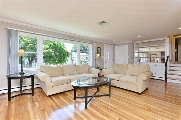 140 Governors Road Quincy, MA 02169 - Photo 6 of 24 a living room with furniture and a large window