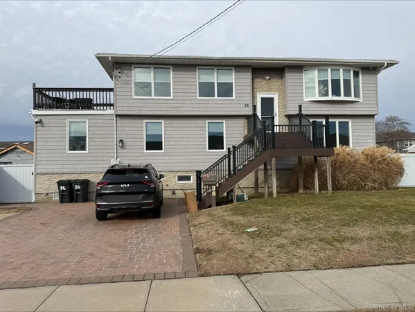 a car parked in front of a house