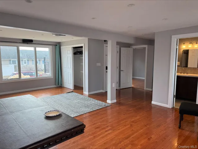 wooden floor and dining room with furniture