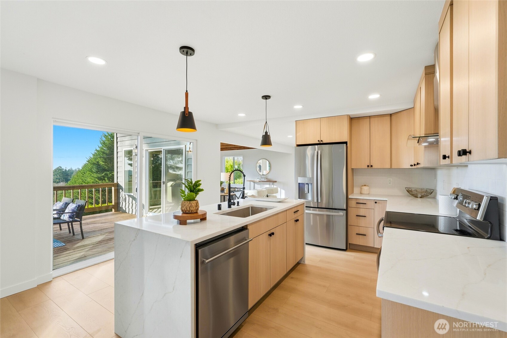 16126 Tiger Mountain Road Southeast Issaquah, WA 98027 - Photo 15 of 38 a kitchen with a sink stove and refrigerator