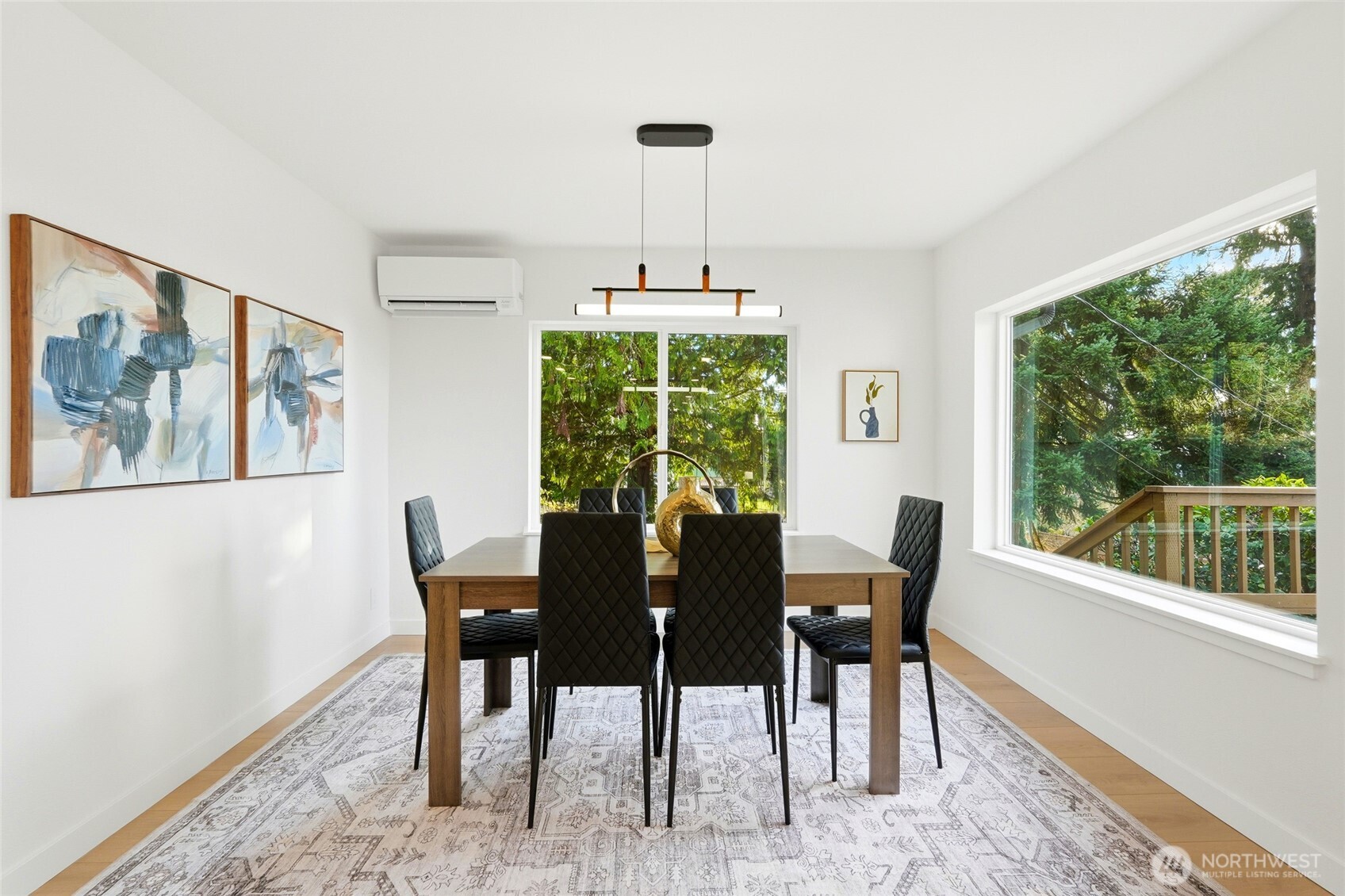 16126 Tiger Mountain Road Southeast Issaquah, WA 98027 - Photo 18 of 38 a view of a dining room with furniture window and outside view