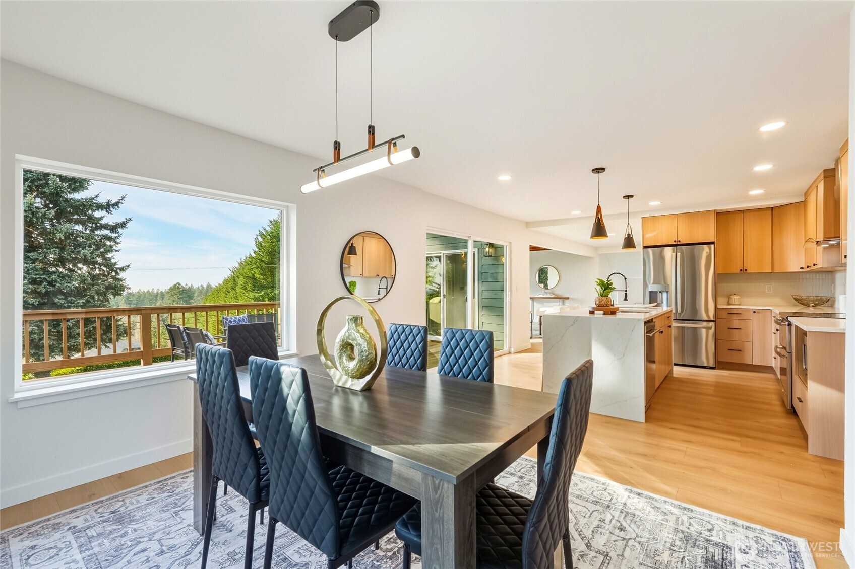16126 Tiger Mountain Road Southeast Issaquah, WA 98027 - Photo 19 of 38 a view of a dining room with furniture window and outside view