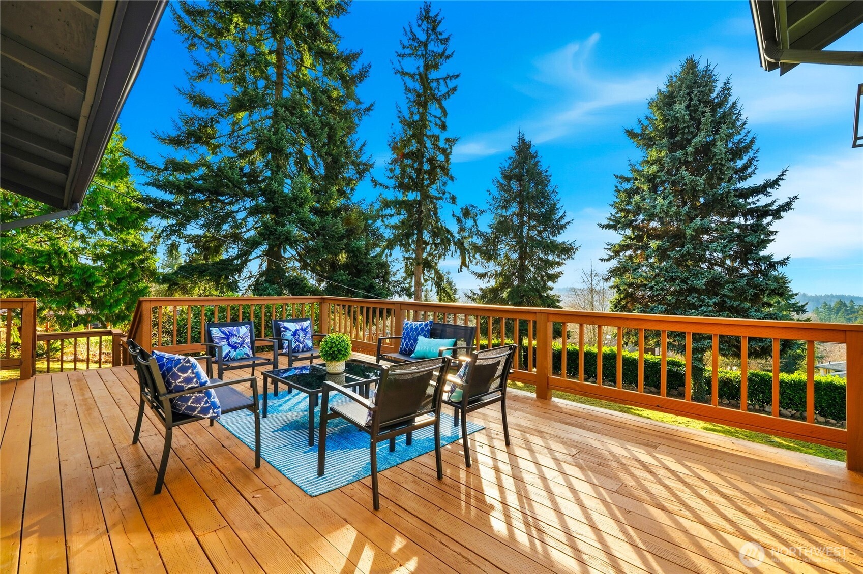 16126 Tiger Mountain Road Southeast Issaquah, WA 98027 - Photo 20 of 38 a view of a chairs and table on the deck