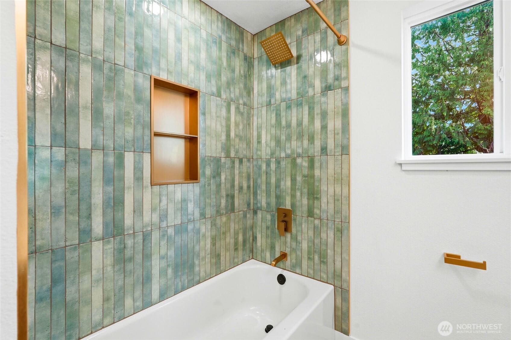 16126 Tiger Mountain Road Southeast Issaquah, WA 98027 - Photo 27 of 38 a bathroom with a bathtub and shower