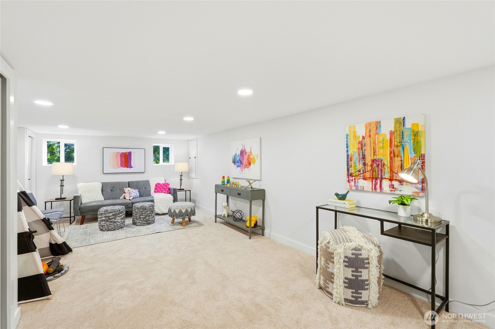 16126 Tiger Mountain Road Southeast Issaquah, WA 98027 - Photo 29 of 38 a living room with furniture and a flat screen tv