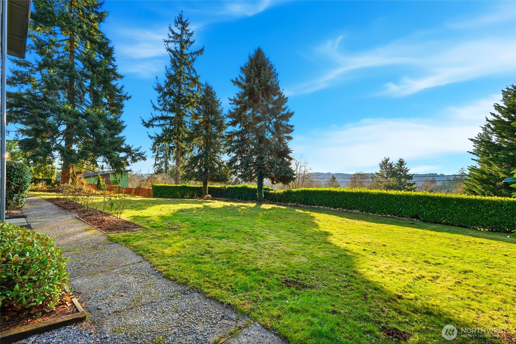 16126 Tiger Mountain Road Southeast Issaquah, WA 98027 - Photo 36 of 38 a view of swimming pool with an outdoor space and seating area