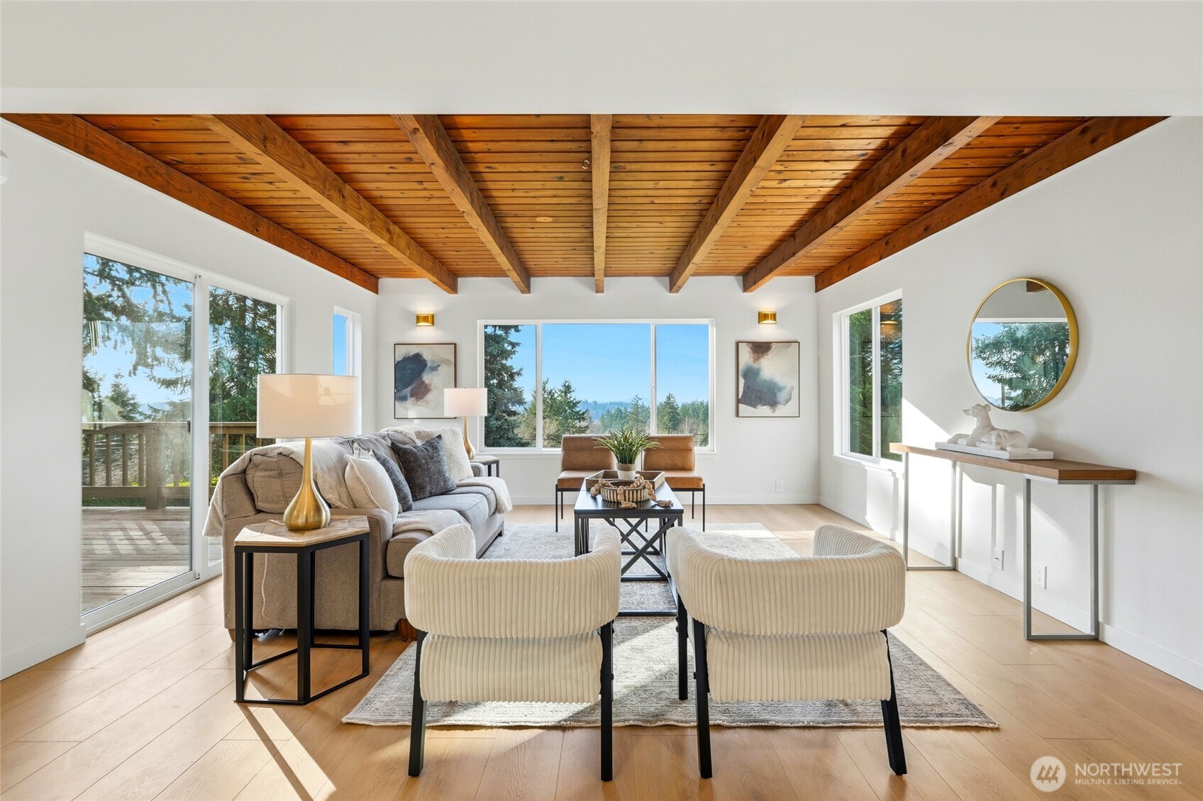 16126 Tiger Mountain Road Southeast Issaquah, WA 98027 - Photo 5 of 38 a dining room with furniture a rug and a large window