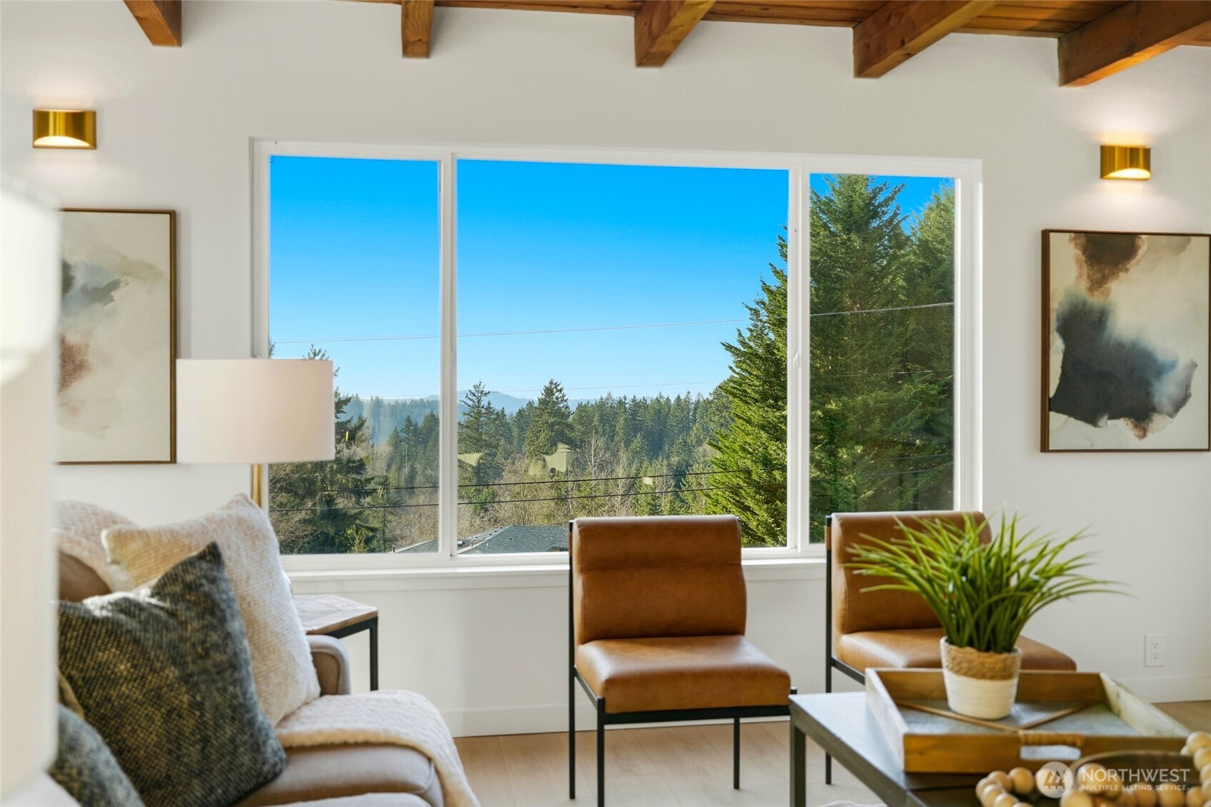 16126 Tiger Mountain Road Southeast Issaquah, WA 98027 - Photo 7 of 38 a balcony with furniture and a potted plant