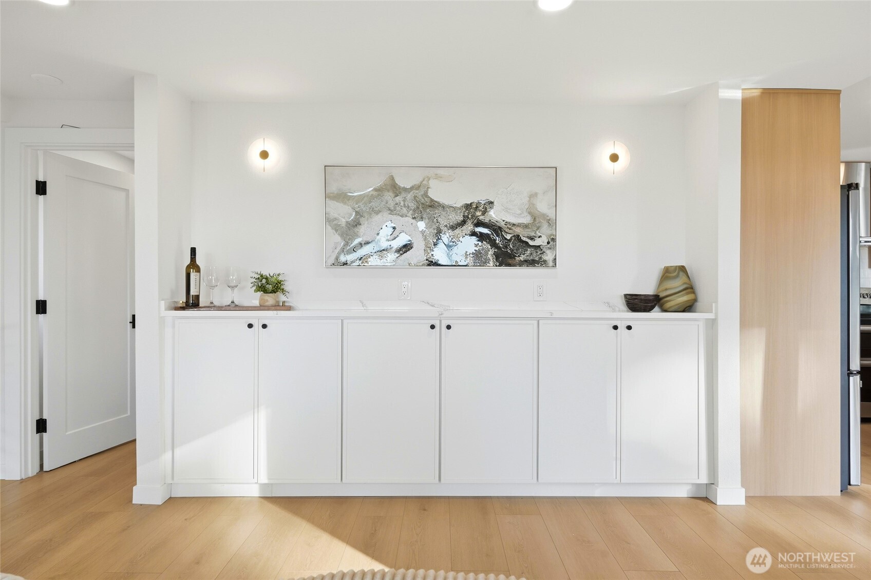 16126 Tiger Mountain Road Southeast Issaquah, WA 98027 - Photo 9 of 38 a view of kitchen with wooden floor