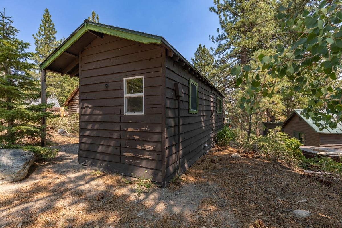 2030 Old Mammoth Road Mammoth Lakes, CA 93546 - Photo 42 of 46 a view of house with a tree