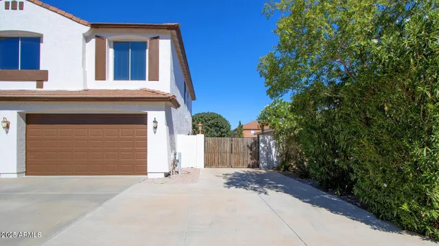 a view of a swimming pool and an outdoor space
