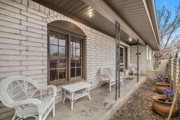 a balcony with furniture