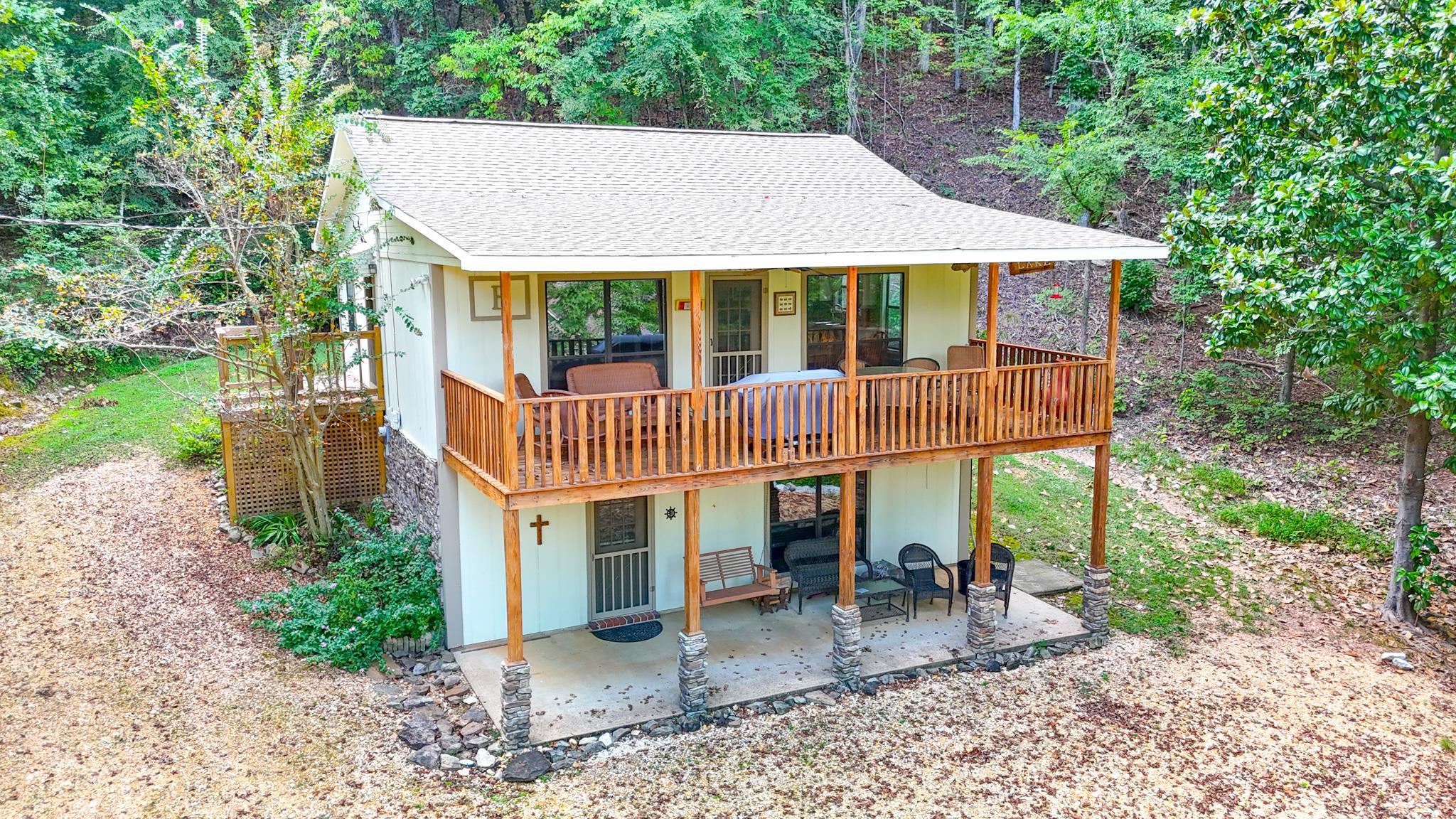 15 Cr 443 Road Iuka, MS 38852 - Photo 1 of 21 Rear view of property featuring a deck and a patio